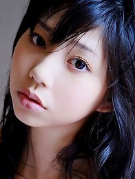Beautiful gravure idol with milky white skin in silky lingerie