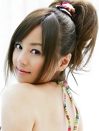 Sweet asian cutie shows off her yummy body in pink lingerie