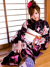 Beautiful gravure idol angel in a cute short dress and boots