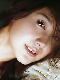 Megumi Yasu Asian cutie showing off her hot body in a bikini