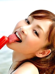 Anri Sugihara shows big boobs in smiling boobs on the beach