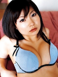 Akina Suzuki in panty takes bra off but hides her big jugs